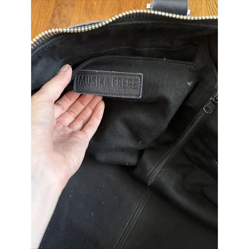 MUSIKA FRERE Handcrafted Leather Duffle Bag